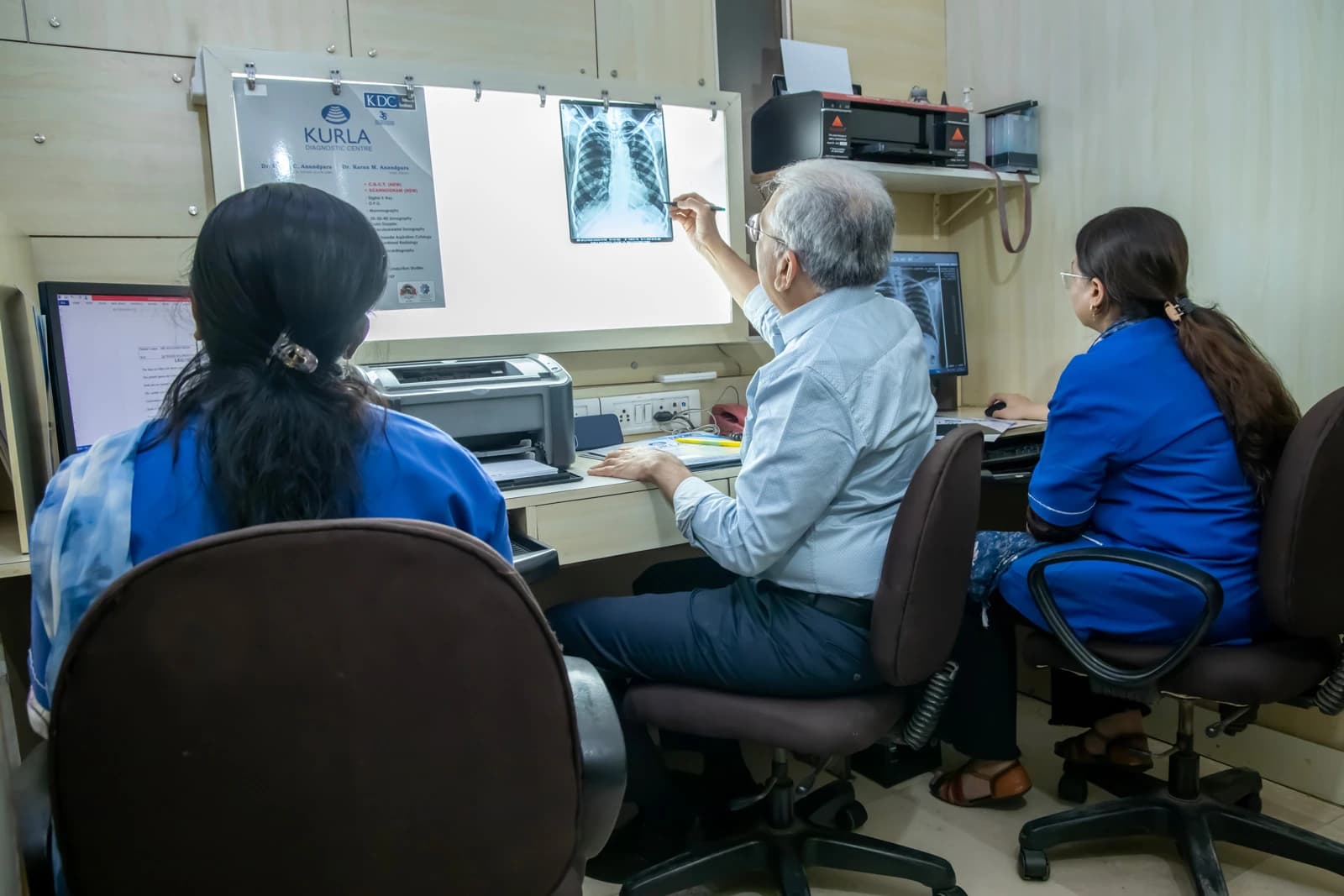 Doctors reviewing diagnostic reports at Kurla Diagnostic Centre